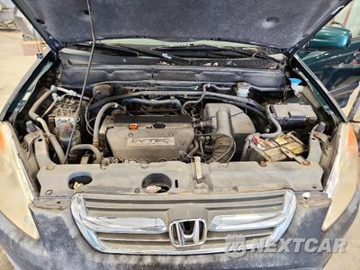 Zdjęcie 12 z 13 samochodu: 2004 HONDA CR-V EX VIN:JHLRD78804C047504 - miniatura