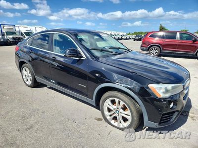 Czwarte zdjęcie samochodu z boku: 2016 BMW X4 XDRIVE28I VIN:5UXXW3C54G0M90165 - miniatura