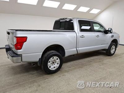 Trzecie zdjęcie samochodu z tyłu: 2017 NISSAN TITAN XD SV VIN:1N6BA1F3XHN568832 - miniatura