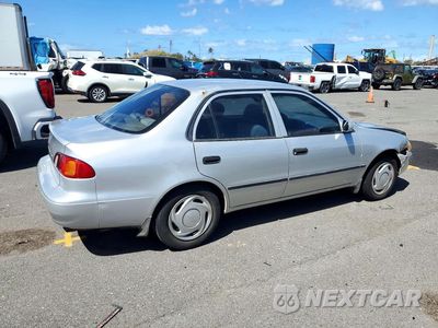 Trzecie zdjęcie samochodu z tyłu: 1999 TOYOTA COROLLA VE VIN:1NXBR12E0XZ275623 - miniatura