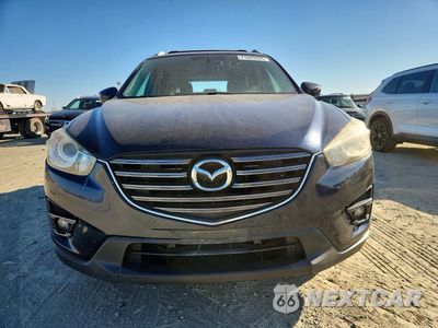 Piąte zdjęcie samochodu w środku: 2016 MAZDA CX-5 TOURING VIN:JM3KE2CY0G0736686 - miniatura