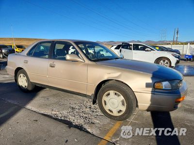 Czwarte zdjęcie samochodu z boku: 1996 TOYOTA CAMRY LE V6 VIN:4T1BF12K9TU138365 - miniatura