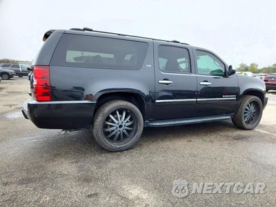 Trzecie zdjęcie samochodu z tyłu: 2013 CHEVROLET SUBURBAN K1500 LTZ VIN:1GNSKKE76DR285204 - miniatura