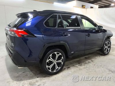 Trzecie zdjęcie samochodu z tyłu: 2025 TOYOTA RAV4 XSE VIN:JTMEB3FV4SD243357 - miniatura