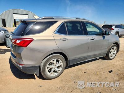 Trzecie zdjęcie samochodu z tyłu: 2018 CHEVROLET EQUINOX PREMIER VIN:3GNAXMEV0JS613197 - miniatura