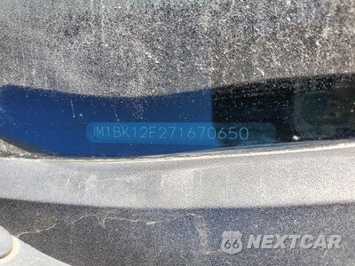 Zdjęcie 12 z 12 samochodu: 2007 MAZDA 3 VIN:JM1BK12F271670650 - miniatura