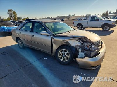Czwarte zdjęcie samochodu z boku: 2002 TOYOTA CAMRY LE VIN:JTDBE32K220093262 - miniatura