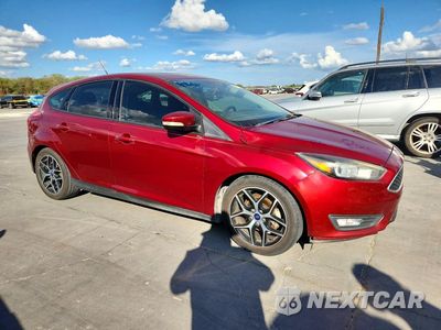 Czwarte zdjęcie samochodu z boku: 2017 FORD FOCUS SEL VIN:1FADP3M27HL341387 - miniatura