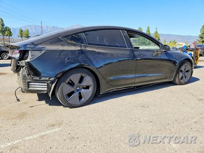 Trzecie zdjęcie samochodu z tyłu: 2019 TESLA MODEL 3 VIN:5YJ3E1EA0KF415717 - miniatura