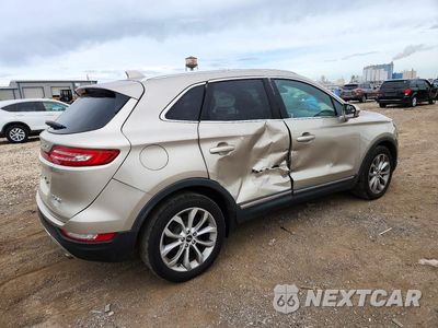 Trzecie zdjęcie samochodu z tyłu: 2015 LINCOLN MKC VIN:5LMCJ2A92FUJ25076 - miniatura