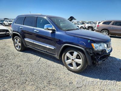 Czwarte zdjęcie samochodu z boku: 2012 JEEP GRAND CHEROKEE OVERLAND VIN:1C4RJFCT0CC227253 - miniatura