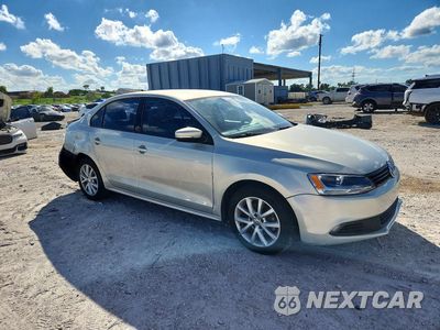 Czwarte zdjęcie samochodu z boku: 2011 VOLKSWAGEN JETTA SE VIN:3VWDX7AJ1BM396787 - miniatura