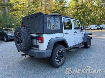 Czwarte zdjęcie samochodu z boku: 2010 JEEP WRANGLER UNLIMITED SPORT VIN:1J4BB3H11AL142174 - miniatura