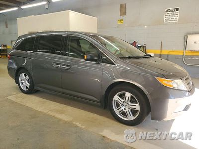 Czwarte zdjęcie samochodu z boku: 2012 HONDA ODYSSEY TOURING VIN:5FNRL5H93CB130147 - miniatura