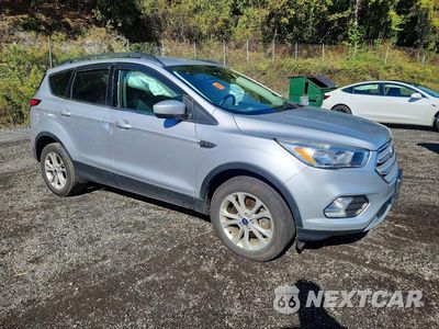 Czwarte zdjęcie samochodu z boku: 2018 FORD ESCAPE SE VIN:1FMCU9GDXJUB33501 - miniatura