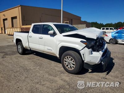Czwarte zdjęcie samochodu z boku: 2026 TOYOTA TACOMA SR5 VIN:3TMKB5FN0TM063975 - miniatura