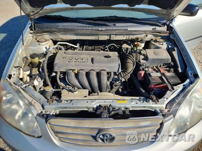 Zdjęcie 11 z 13 samochodu: 2004 TOYOTA COROLLA CE VIN:JTDBR32EX42028603 - miniatura