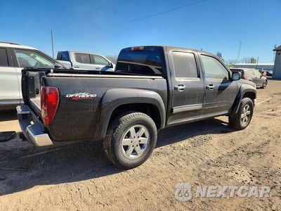 Trzecie zdjęcie samochodu z tyłu: 2011 GMC CANYON SLE VIN:1GTH6MFE7B8125884 - miniatura