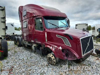 Czwarte zdjęcie samochodu z boku: 2016 VOLVO VN VNL VIN:4V4NC9EH2GN932623 - miniatura
