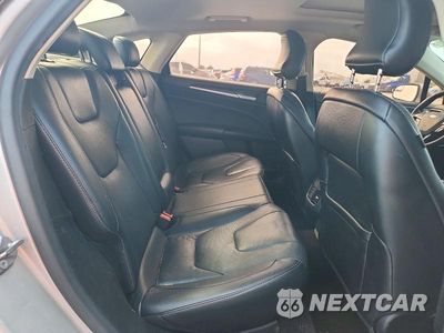 Zdjęcie 10 z 12 samochodu: 2017 FORD FUSION TITANIUM VIN:3FA6P0K91HR130727 - miniatura