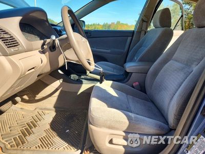 Zdjęcie 7 z 12 samochodu: 2004 TOYOTA CAMRY LE VIN:4T1BE32KX4U832160 - miniatura