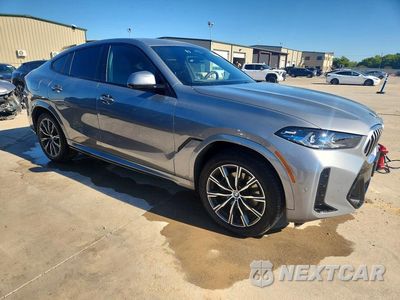 Czwarte zdjęcie samochodu z boku: 2027 BMW X6 XDRIVE40I VIN:5UX33EX06V9432908 - miniatura