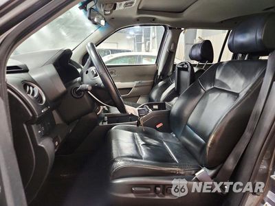 Zdjęcie 7 z 13 samochodu: 2009 HONDA PILOT TOURING VIN:5FNYF48889B011619 - miniatura
