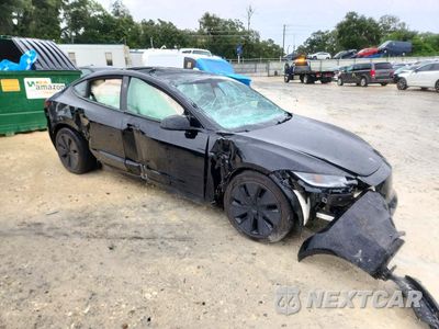 Czwarte zdjęcie samochodu z boku: 2025 TESLA MODEL 3 VIN:5YJ3E1EA5SF970257 - miniatura