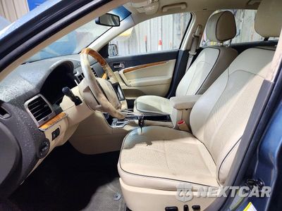 Zdjęcie 7 z 12 samochodu: 2012 LINCOLN MKZ HYBRID VIN:3LNDL2L35CR825364 - miniatura