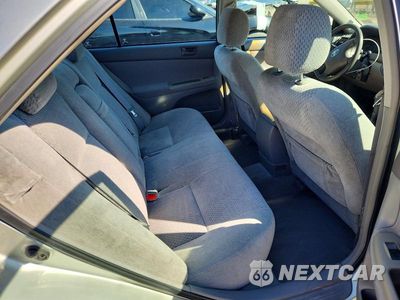Zdjęcie 10 z 12 samochodu: 2004 TOYOTA CAMRY LE VIN:4T1BE32K94U806715 - miniatura
