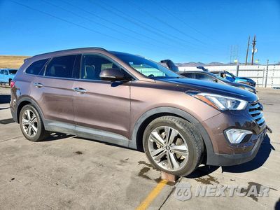 Czwarte zdjęcie samochodu z boku: 2014 HYUNDAI SANTA FE LIMITED VIN:KM8SRDHFXEU065108 - miniatura
