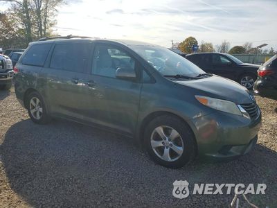 Czwarte zdjęcie samochodu z boku: 2011 TOYOTA SIENNA LE VIN:5TDKK3DCXBS042796 - miniatura