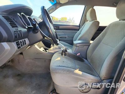Zdjęcie 7 z 13 samochodu: 2011 TOYOTA TACOMA V6 VIN:3TMLU4EN1BM064206 - miniatura