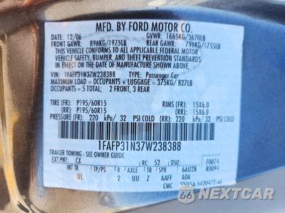 Zdjęcie 12 z 12 samochodu: 2007 FORD FOCUS ZX3 VIN:1FAFP31N37W238388 - miniatura