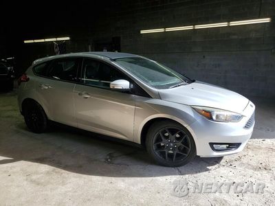 Czwarte zdjęcie samochodu z boku: 2016 FORD FOCUS SE VIN:1FADP3K20GL206057 - miniatura