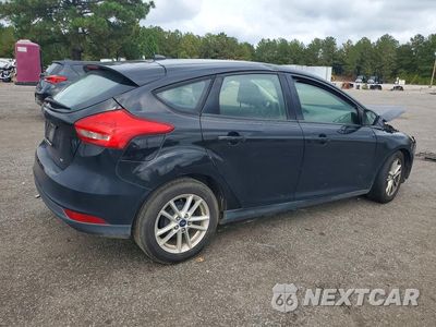 Trzecie zdjęcie samochodu z tyłu: 2018 FORD FOCUS SE VIN:1FADP3K22JL329446 - miniatura
