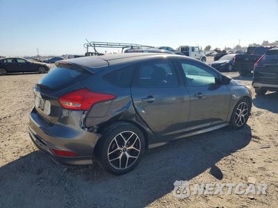 Trzecie zdjęcie samochodu z tyłu: 2016 FORD FOCUS SE VIN:1FADP3K20GL362437 - miniatura