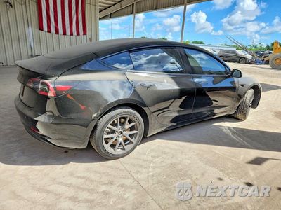 Trzecie zdjęcie samochodu z tyłu: 2023 TESLA MODEL 3 VIN:5YJ3E1EA9PF458119 - miniatura