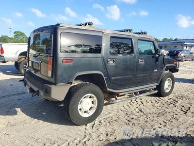 Trzecie zdjęcie samochodu z tyłu: 2003 HUMMER H2 VIN:5GRGN23U23H109588 - miniatura