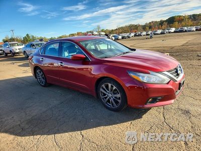 Czwarte zdjęcie samochodu z boku: 2018 NISSAN ALTIMA 2.5 SR VIN:1N4AL3AP7JC280580 - miniatura
