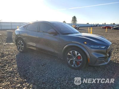 Czwarte zdjęcie samochodu z boku: 2021 FORD MUSTANG MACH-E PREMIUM VIN:3FMTK3SU9MMA07620 - miniatura