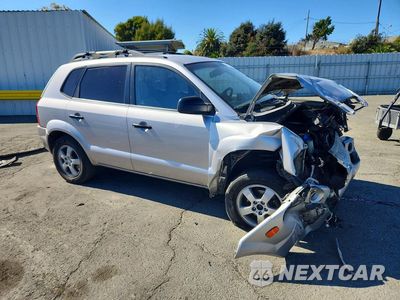 Czwarte zdjęcie samochodu z boku: 2005 HYUNDAI TUCSON GL VIN:KM8JM12BX5U195176 - miniatura