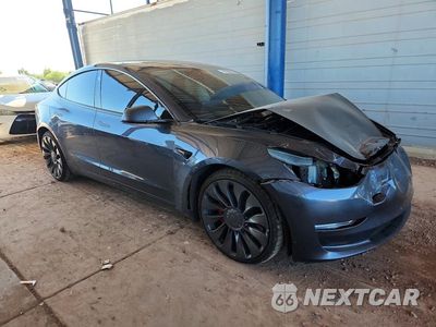 Czwarte zdjęcie samochodu z boku: 2023 TESLA MODEL 3 VIN:5YJ3E1EC4PF701742 - miniatura