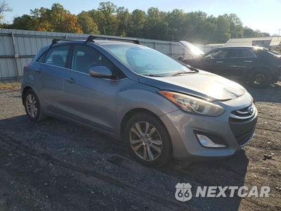 Czwarte zdjęcie samochodu z boku: 2014 HYUNDAI ELANTRA GT BASE VIN:KMHD35LH4EU216226 - miniatura