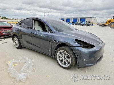 Czwarte zdjęcie samochodu z boku: 2021 TESLA MODEL Y VIN:5YJYGAEE2MF134525 - miniatura