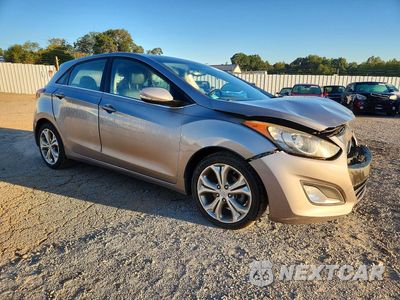 Czwarte zdjęcie samochodu z boku: 2013 HYUNDAI ELANTRA GT BASE VIN:KMHD35LE9DU091079 - miniatura