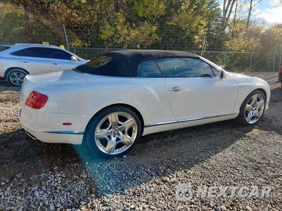 Trzecie zdjęcie samochodu z tyłu: 2013 BENTLEY CONTINENTAL GTC VIN:SCBGU3ZA5DC084842 - miniatura