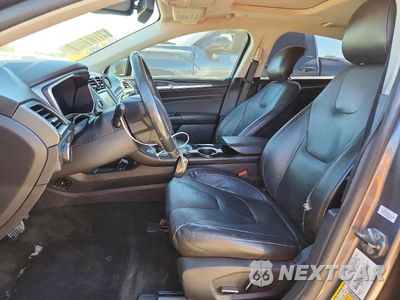 Zdjęcie 7 z 13 samochodu: 2013 FORD FUSION TITANIUM PHEV VIN:3FA6P0SU0DR332425 - miniatura
