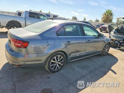 Trzecie zdjęcie samochodu z tyłu: 2017 VOLKSWAGEN JETTA SE VIN:3VWDB7AJ5HM291788 - miniatura