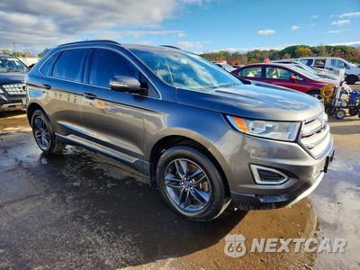 Czwarte zdjęcie samochodu z boku: 2015 FORD EDGE SEL VIN:2FMTK4J80FBC04786 - miniatura